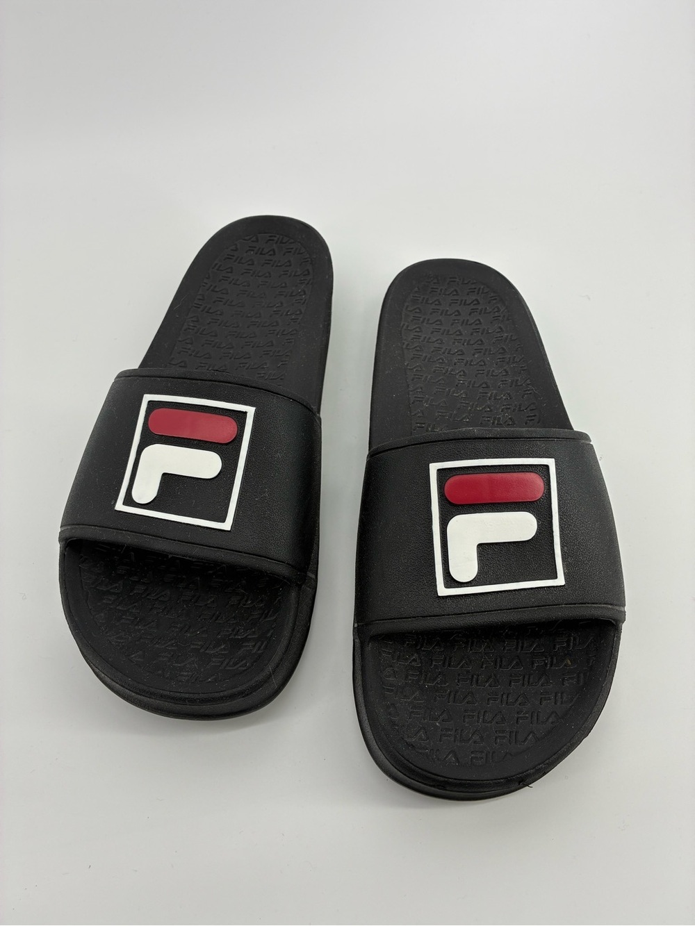 Fila Black Slide Sandals with Red and White Logo Accents
